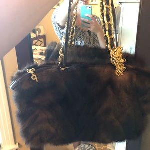 Real fur purse with real leather trim